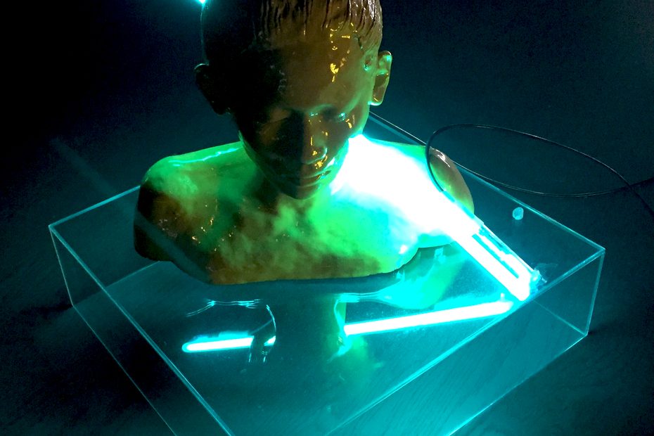 Yellow glazed ceramic bust with turquoise neon light – Inner Light